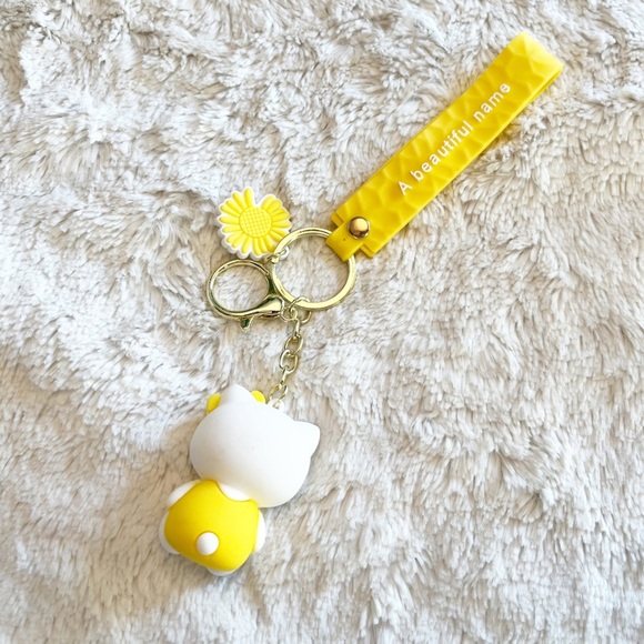 Sanrio Hello Kitty Yellow Keychain Bag Accessory Wristlet - Picture 2 of 2
